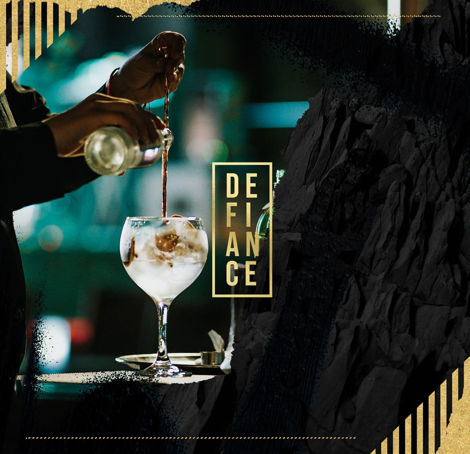 A cocktail being poured beside the gold Defiance logo