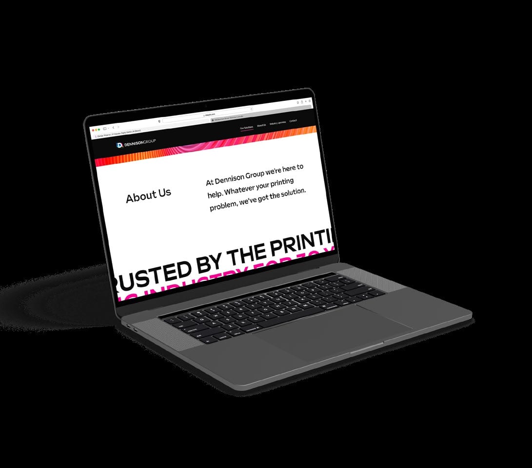 Dennison Group About Us page on a laptop.