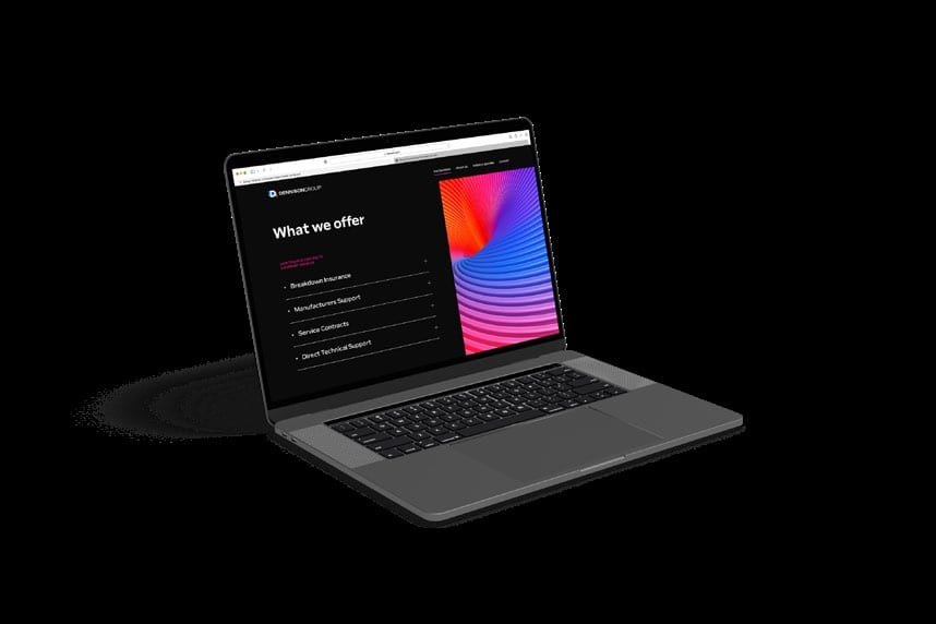 Dennison Group website services page on a laptop.