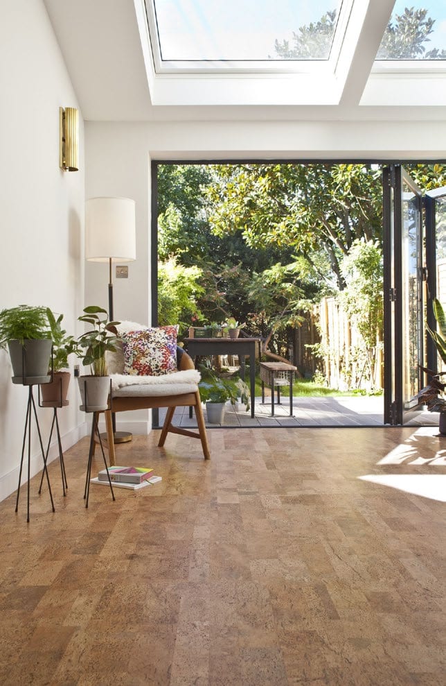 A bright interior with natural wood flooring.
