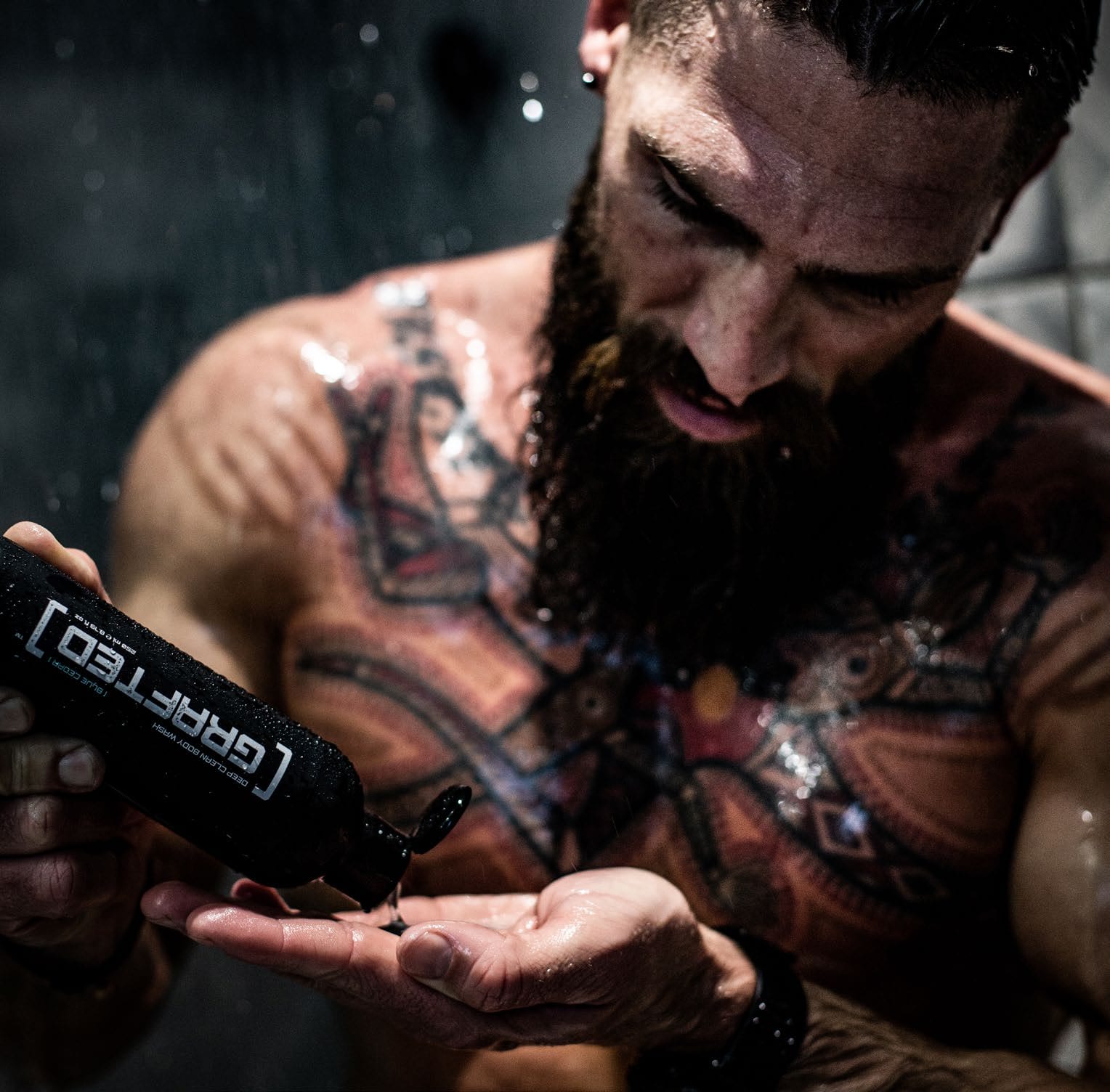 A man applying Grafted grooming product