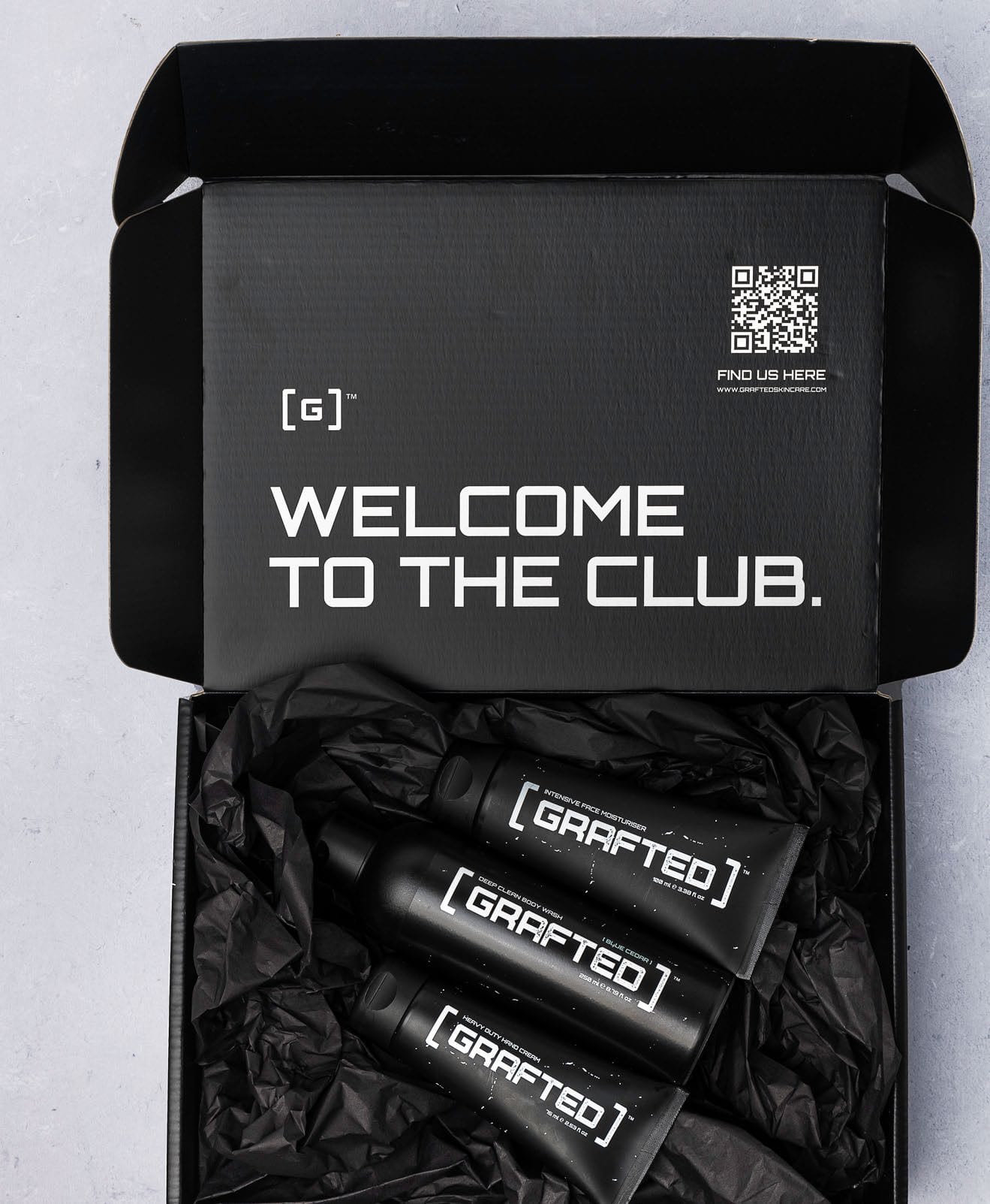 Grafted subscription box, Welcome to the Club, with black product tubes.