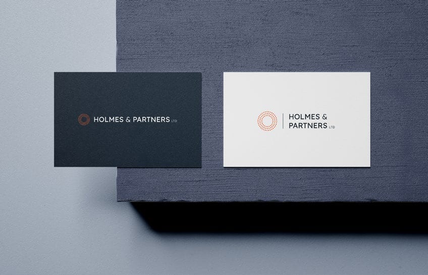 Holmes & Partners business cards.