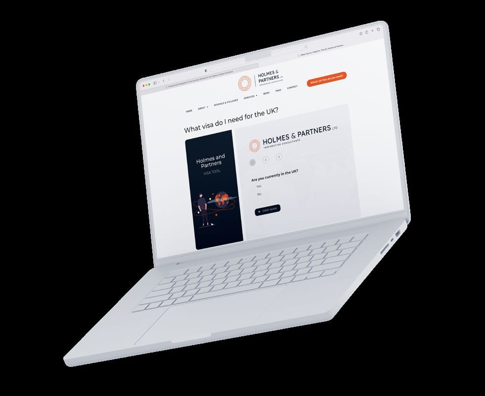 Holmes & Partners website on a laptop.