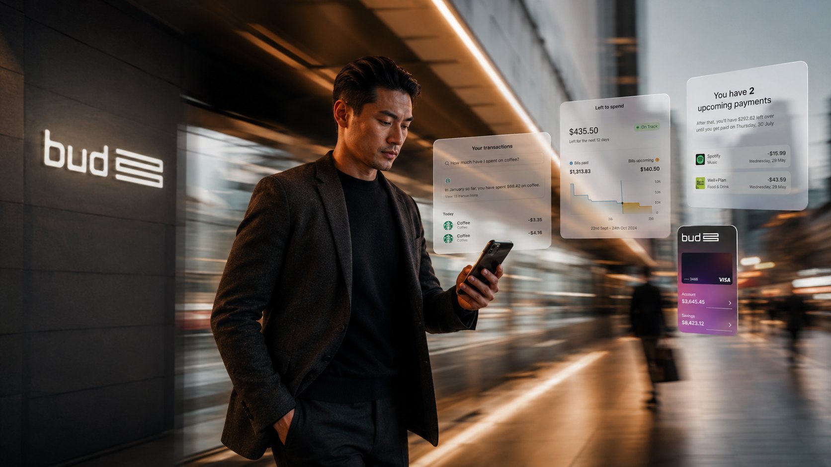 A suited executive checking a phone in a dark, warm-lit interior, Bud Financial case study image.