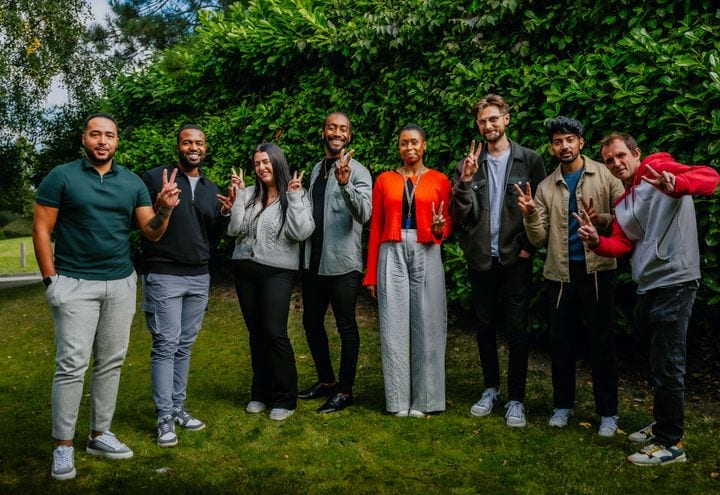 The 21 Degrees team together outdoors.