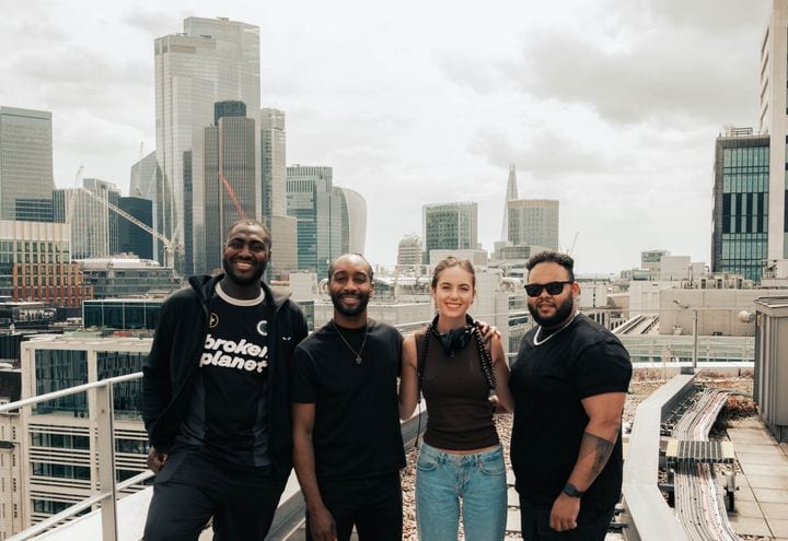 Four 21 Degrees colleagues on a London rooftop.