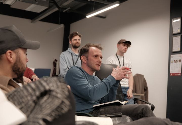 The 21 Degrees team in discussion at the studio.