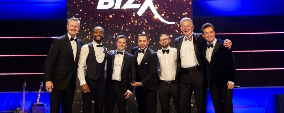 The 21 Degrees team on stage receiving the BizX Best Marketing Campaign 2024 award